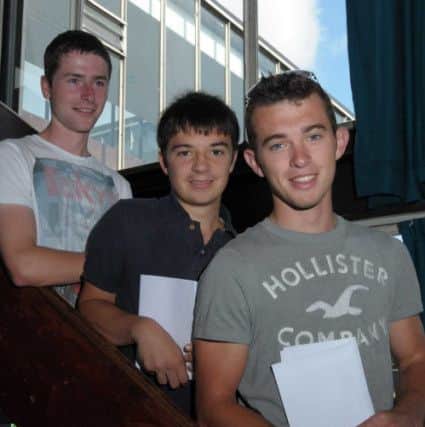 GCSE results day at Dinnington Comprehensive, pictured are Joel Wakefield, Ross Tenny and Sam Brookfield (w130822-3b)