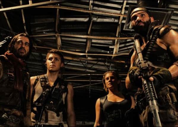 Undated Film Still Handout from Riddick. Pictured: JORDI MOLLA as Santana, KATEE SACKHOFF as Dahl, RAOUL TRUJILLO as Lockspur, DAVE BAUTISTA as Diaz and NOLAN GERARD FUNK as Luna. See PA Feature FILM Film Reviews. Picture credit should read: PA Photo/Entertainment One. WARNING: This picture must only be used to accompany PA Feature FILM Film Reviews.
