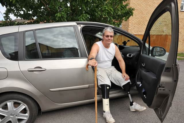 Double amputee Tim Griffith had problems obtaining a new blue badge despite having been given lifelong immunity against parking restrictions (w130903-3b)