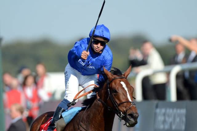 Mickael Barzalona and Encke celebrates after beating hot favourite Camelot and Joseph O Brien to win the Ladbrokes St Leger Stakes during the Ladbrokes St Leger Festival at Doncaster Racecourse. PRESS ASSOCIATION Photo. Picture date: Saturday September 15, 2012. See PA Story RACING Doncaster. Photo credit should read: John Giles/PA Wire.