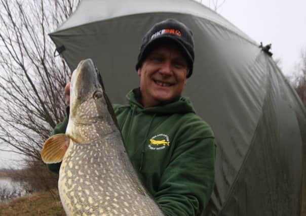 Alan Dudhill with a pike