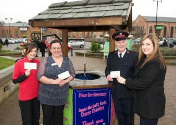 Danielle Bradford from GAPA, Kay Chambers from St Barnabas Hospice and Major Geoff Martin from the Salvation Army - charities benefiting from the funds raised - with Alison Hall, centre manager at Marshall's Yard.
