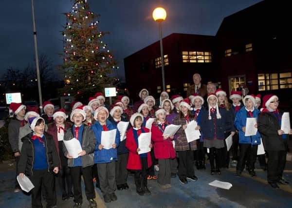 Children from Norbridge Academy sang carols at the Bassetlaw Hospital's annual Christmas Tree lighting performed by chairman Chris Scholey and Rev Simon Russell on Monday