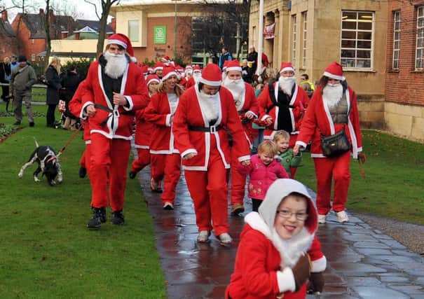 Annual Santa Dash in aid of Aurora Wellbeing Centre, the Santa Dash gets underway (w121201-1d)