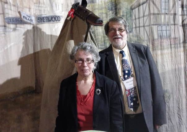 Speaker Anna Hallett and socirty chairman Mike Jones with the hobby horse