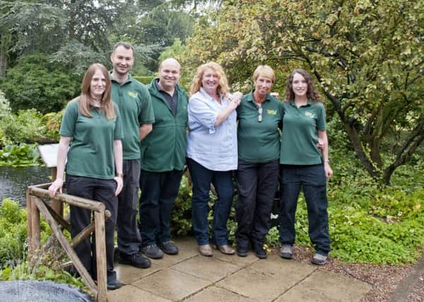 Charlie Dimmock at Wayside Water Gardens for a BBC Gardening Show (left to right) Natalie Pilgrim, Paul Marsh, Simon Brothwell, Adele Ball and Stephanie Spence
