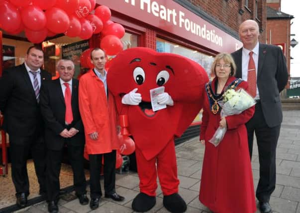Opening of new British Heart Foundation furniture and electrical store, pictured are from left area manager Chris Ward, Store manager Mark Shortland, BHF researcher at University of Sheffield Dr Tim Ellam, Coun Sybil Fielding and regional manager Barry Greenstreet 
(NWGU-07-01-14 RA 1)