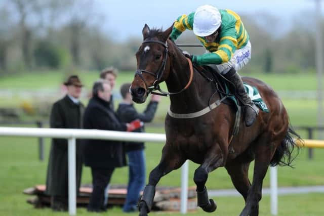FESTIVAL MEMORIES -- Alderwood, ridden by Tony McCoy, the winner of the last race at last year's Cheltenham Festival. (PHOTO BY : Barry Cronin/PA Wire).