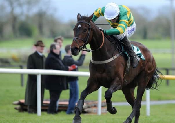 FESTIVAL MEMORIES -- Alderwood, ridden by Tony McCoy, the winner of the last race at last year's Cheltenham Festival. (PHOTO BY : Barry Cronin/PA Wire).