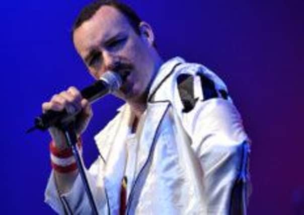 Rob Comber as Freddie Mercury in tribute band The Bohemians