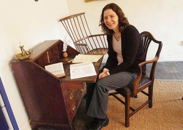 Rev. Claire Potter in the Samuel Wesley study at the Old Rectory, Epworth.  (Buy this photo E2135TS) Picture: Tony Saxton