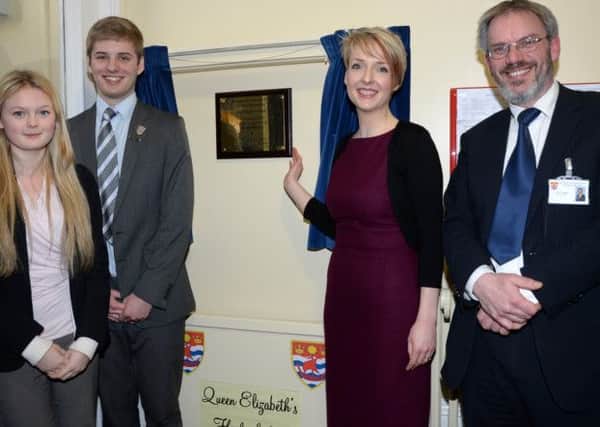 Former pupil Helen Allen opened the renovated College House at Queen Elizabeth's High School in Gainsborough. She is pictured with Headteacher David Allsop and students Leah Williams and William Holliday