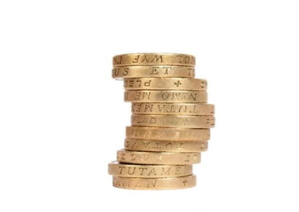 A stack of pound coins.