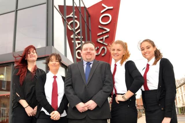 Savoy Cinema Worksop are celebrating their 2nd birthday, pictured with manager Wayne Gregory are from left supervisor Emily Marshall, Meri Isherwood, Olivia Wankiewicz and Jenna Stevens
(NWGU-19-03-14 RA 1a)