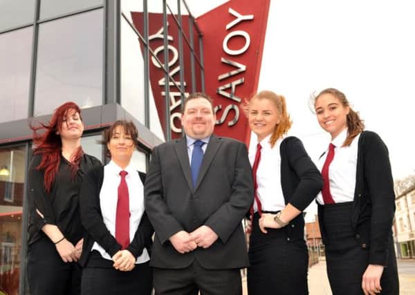 Savoy Cinema Worksop are celebrating their 2nd birthday, pictured with manager Wayne Gregory are from left supervisor Emily Marshall, Meri Isherwood, Olivia Wankiewicz and Jenna Stevens
(NWGU-19-03-14 RA 1a)