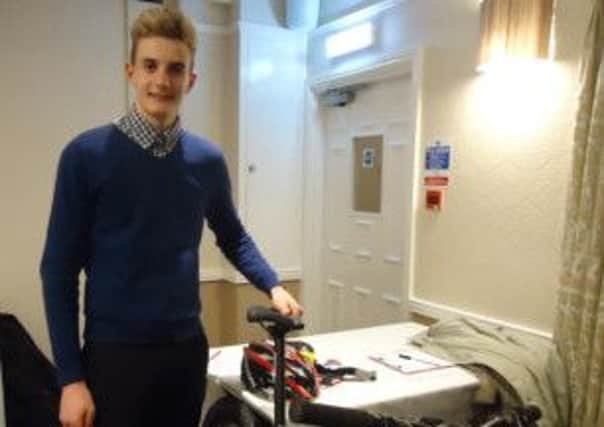 Harry Lewis with his racing bike