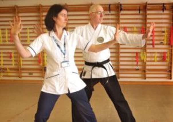Physiotherapist Helen Sparks and Tai Chi trainer Ken Campbell