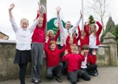 Head teacher Jeremy Bingham and pupils celebrate East Markham's fine Ofsted result