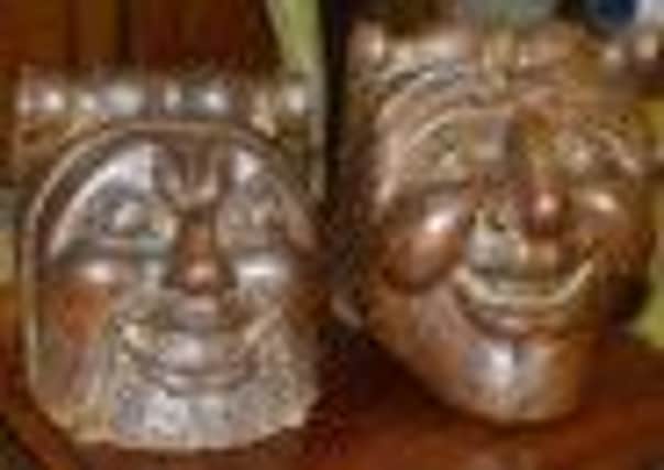 Continental life-sized carved oak character faces stolen from Hemswell Antiques Centre.