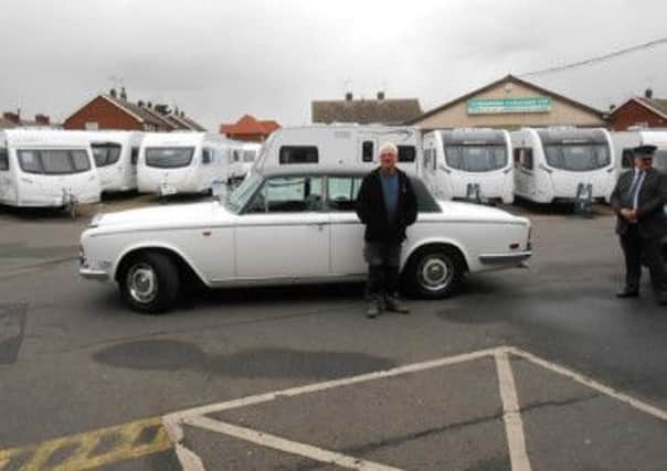 Mr Warsop with the 1970 silver storm Rolls Royce