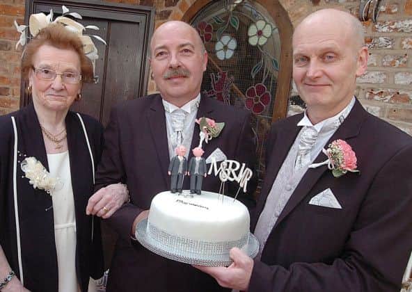 Alvin and Kevin Robinson with Alvin's mum Margaret enjoy their wedding day at the Red Lion, Epworth. (Buy this photo E2286TS) Picture: Tony Saxton