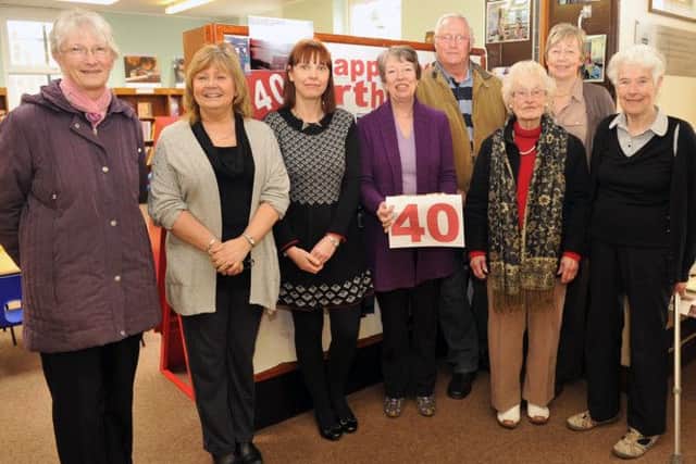Staff members past and present celebrate Kiveton Library's 40th birthday