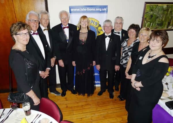 Picture at the 47th Isle of Axholme Lions Charter Dinner are: (L-R) Jannie and Henk Verweel from d'Bernisse Lions in the Netherlands; Paul Rijkse - vice president of d'Berinisse Lions; Peter Lindley - President of the Isle of Axholme Lions; Rosie Swale Pope MBE - guest speaker; Graham Guest - vice president of the Isle Lions; District Vice Governor Alan Hall; Janet Guest; Carol Lindley; and Jane Hall.