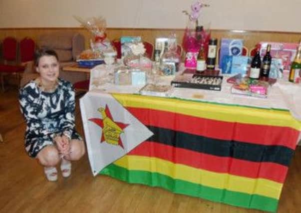Olivia Johnson held a fundraiser for her trip to Zimbabwe this summer.