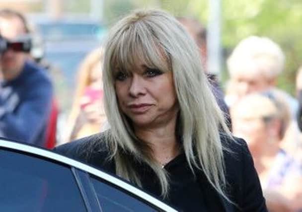 Jo Wood arrives at St Mary Magdalene and St Lawrence Church in Davington, near Faversham, Kent, for the funeral service of Peaches Geldof. PRESS ASSOCIATION Photo. Picture date: Monday April 21, 2014. See PA story FUNERAL Peaches. Photo credit should read: Gareth Fuller/PA Wire