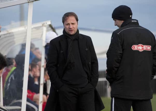 Worksop Town manager Mark Shaw has one eye firmly on the Tigers' upcoming play-off game
