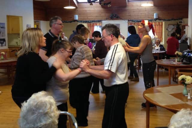 Residents of Clayton House Care Home performing at the Christmas Party
