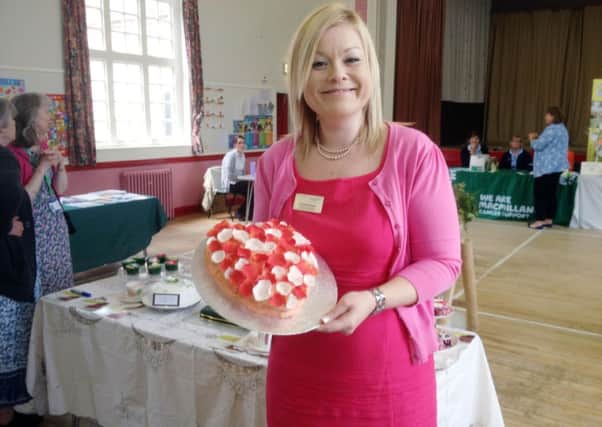 Alzheimer's Society manager Lisa Hickman with her Heart and Soul cake.