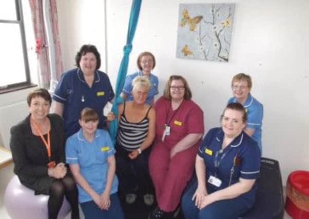 Staff at Scunthorpe Hospital celebrate the opening of the Butterfly room. Pictured (from left) are Karen Jackson, chief executive of the Trust, Hayley Brown, midwife, Kim Sheppard, ward manager on the central delivery suite, Kelly Whiteley, patient, Margaret Burdett, midwife, Linda Sanderson, midwife, Mary Townsend, midwife and Wendy Waldron, central delivery suite coordinator.