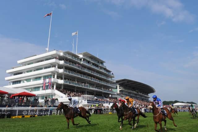 SETTING FOR A CLASSIC -- Epsom Downs racecourse, which will stage the Investec Oaks (PHOTO BY: Nigel French/PA Wire).