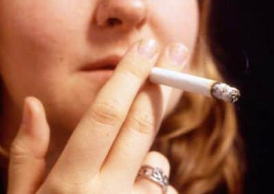 A woman smoker.