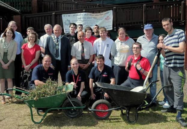 Volunteers help clean up Gainsborough Lea Road station. Picture: Barrie Codling