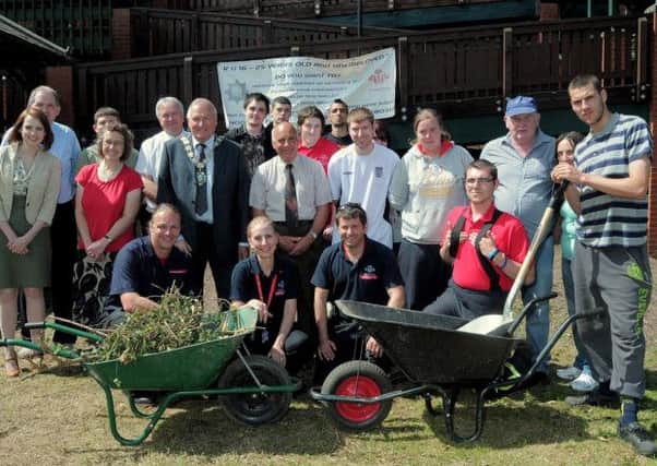Volunteers help clean up Gainsborough Lea Road station. Picture: Barrie Codling