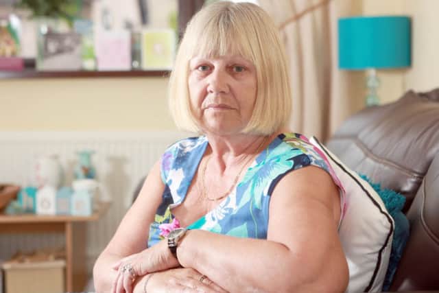 Picture shows Pauline Briggs, 64 from Sheffield, South Yorkshire. Pauline went through three passport checks accidently using her deceased husbands passport to go on holiday with her family to Fuerteventura. See Ross Parry copy RPYPASSPORT : A widow who was going on a family holiday managed to get to her destination - going through two passport checkpoints and security - on her dead husband's passport. Blonde Pauline Briggs went through two checks at East Midlands Airport as she was jetting off to Fuerteventura showing the picture of her husband, Paul - with his dark close hair cut and masculine features. Pauline, 64, was horrified when she arrived with her granddaughter, grandson-in-law and their two children, when the officer at passport control looked at all five passports and then asked: "Where is Mr Briggs?" The grandmother-of-10 said: "The question really threw me, I said 'I'm Pauline Briggs' but he said 'But where is Mr Briggs?' and I said 'well... he's dead.'
rossparry.co.uk / Steven Schofield