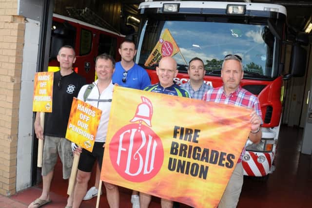 Firefighters during previous strike action at Doncaster Fire Station. Picture: Andrew Roe