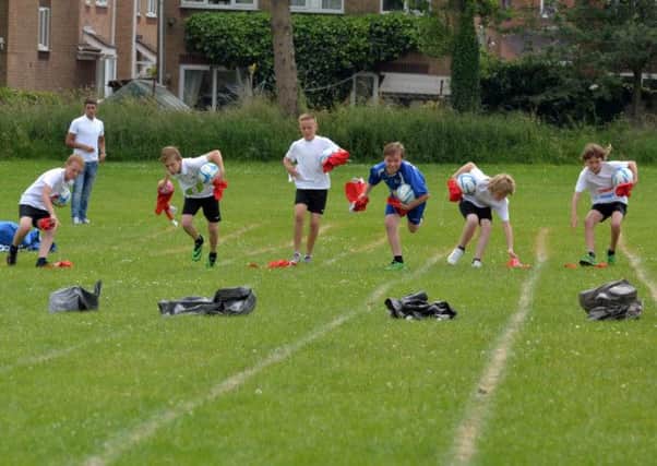 Whitwell Primary School held a football themed sports day with special guest Aston Villa footballer Matt Lowton