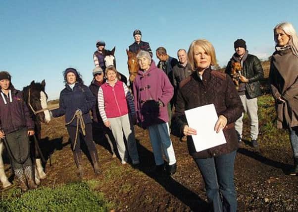 Diane Brough with fellow Belton residents at the site of the Solar panels.  (Buy this photo E1564TS) Picture: Tony Saxton