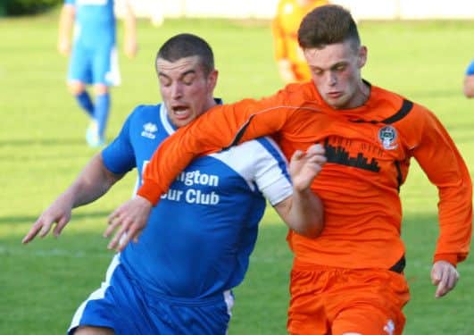 Retford's Reece Thompson gets past Rossington's Willie McGhie during United's 5-3 pe-season win. Picture: Jon Knight
