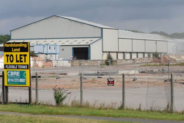 Worksop Recycling Centre, Shireoaks Road, Worksop.Fire at the centre.  A warehouse to the rear of the site has caught fire.Picture: Smoke can be seen coming from a building from Sandy Lane. w100728-1b