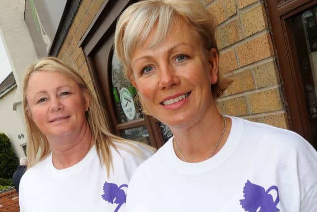 Leesa Sharp (l) and Maxine Strong with their new t-shirts for the Pride of the Isle. Picture: Andrew Roe