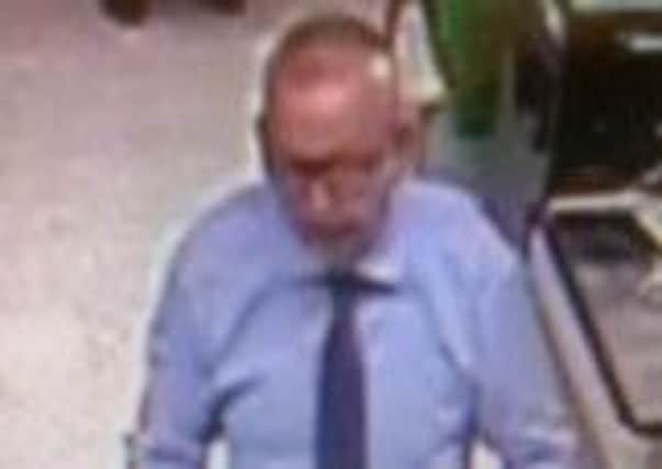 Police want to speak to this man after cash was stolen from an Asda store in Retford