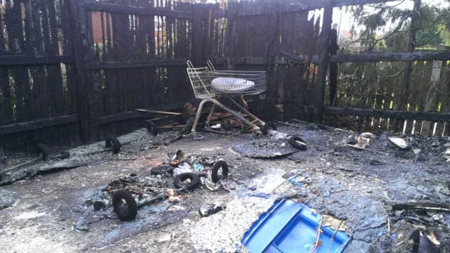 Twenty wheelie bins were destroyed by fire in a wooden compund on Woodland Court in Worksop