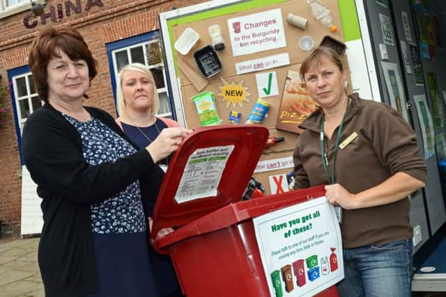 Marj Prendergast, Waste Recycling Services officer, Karen Broderick, Waste Support Services Manager and Clair Moore,Education and Communication Officer, pictured at Epworth Market Place informing people of the changes coming into force regarding the Burgandy Bins. Picture: Marie Caley NEPB 09-09-14 Pledge 4 Plastics MC 2