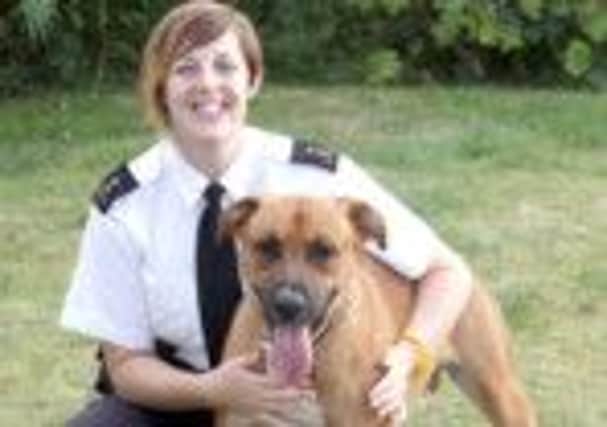RSPCA inspector Michelle McNab wityh Rocky who was successfully fostered and has now been re-homed. Picture: Tony Waugh
