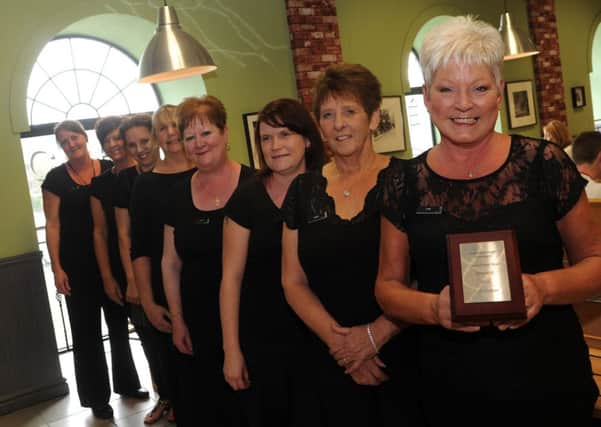 Staff at Cafe Culture, Oldrids Department Store, with their Cafe of the Year Award. Picture: Andrew Roe