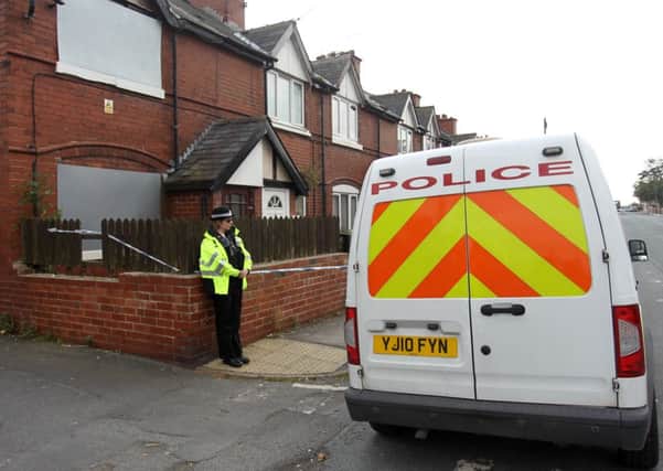 Police outside a house on Morrell Street in Maltby.